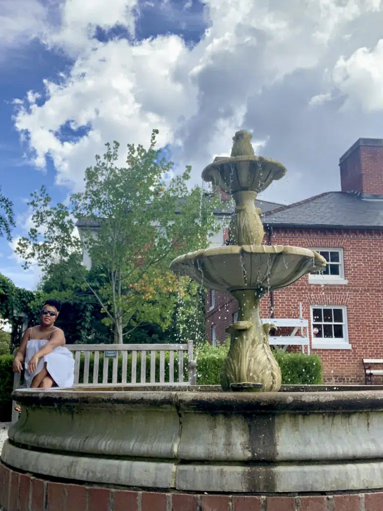 Posing by the water fountain at Robert Mills Gardens_Columbia South Carolina