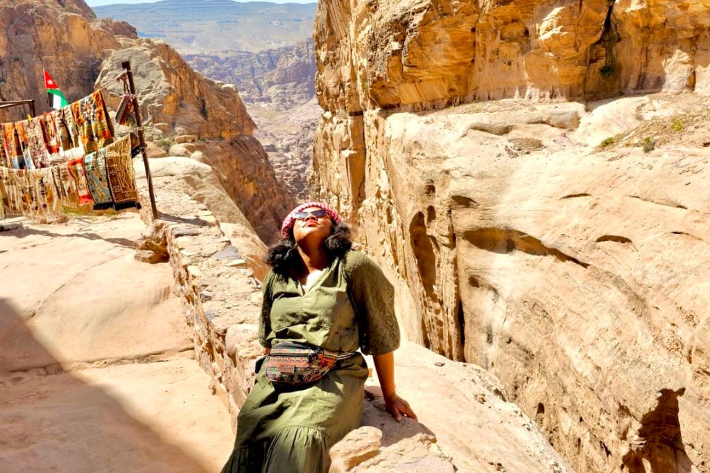 Solo traveler exploring Petra as a part of her Jordan Itinerary
