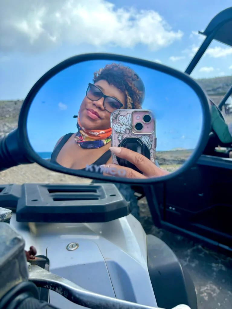 Taking a selfie in the ATV mirror 