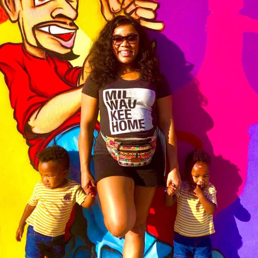 Me and my twin boys in front of a colorful street mural in Wynwood – a must-add to any Miami itinerary. 