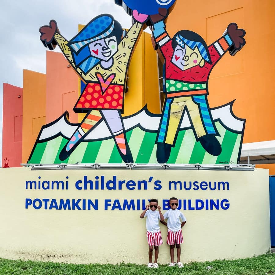 The boys in front of the Miami Children's Museum – the perfect addition to any Miami itinerary with kids.