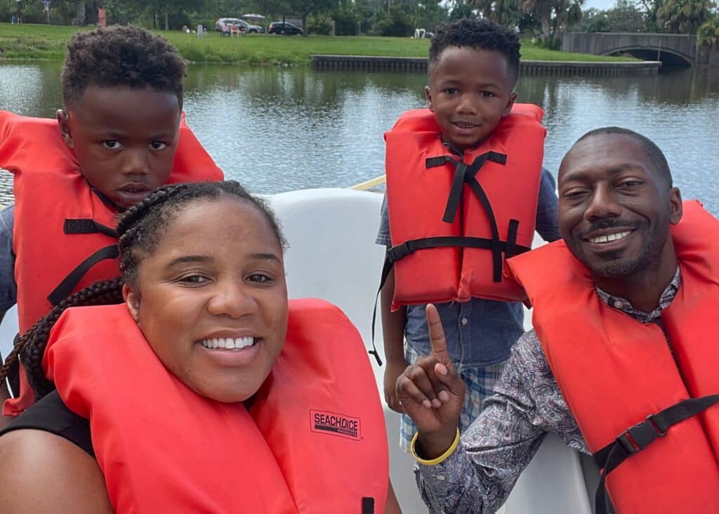 The family on a pedal boat at New Orleans City Park. The variety of exciting activities available is another reason why the answer to "is New Orleans worth visiting?" is yes!