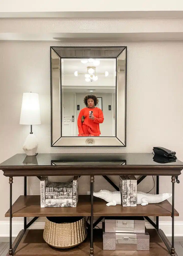 Taking a selfie in front of the elevator lobby decor at JW Marriott New Orleans.
