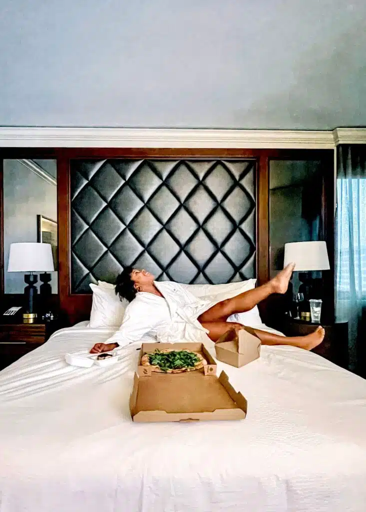 Me enjoying a pizza and a staycation at the JW Marriott in New Orleans.