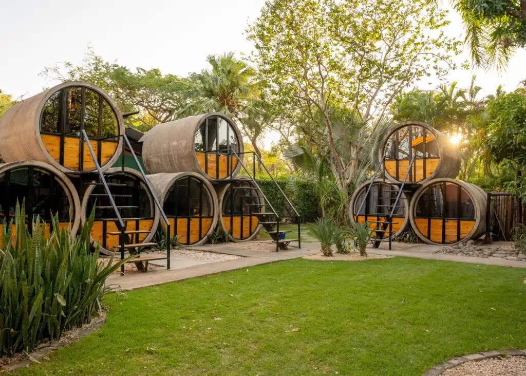 Private barrel compartments at the Pipe House Playa Grande. If you're wondering where to stay in Tamarindo, this is a great option for budget travelers.