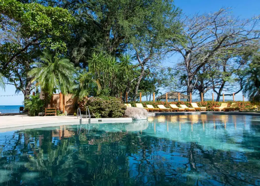 The beautiful pool and lounge area at Capitan Suizo Beachfront Boutique Hotel, a wonderful place to stay in Tamarindo