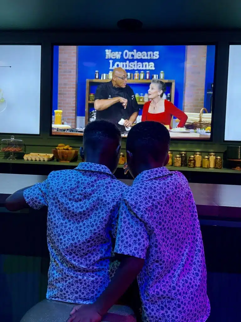 My twin boys at Vue Orleans playing with the interactive bar and food menu- a great, air conditioned thing to do in New Orleans in July-