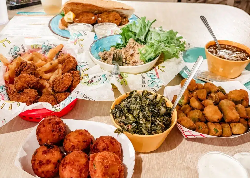 A table filled with Southern dishes at LuLu’s in Gulf Shores including fried seafood and fries. Marquita’s favorite was the smoked tuna dip served with chips and fresh lettuce.